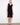 Elegant dress featuring a V-neckline and sleeveless design, perfect for warm weather outings. Crafted with care by Charlie B.