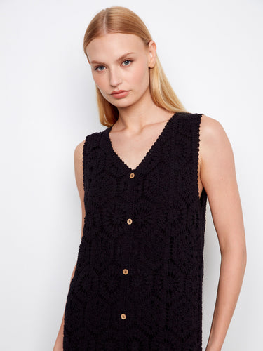 Stylish outfit with decorative button detail that enhances the overall look, offering both elegance and functionality. By Charlie B.