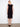Fashionable garment in a sleeveless cut for ease of movement, ideal for layering or wearing alone. Created by Charlie B.