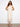 The intricate crochet pattern adds a touch of elegance to this versatile sleeveless summer dress by Charlie B.