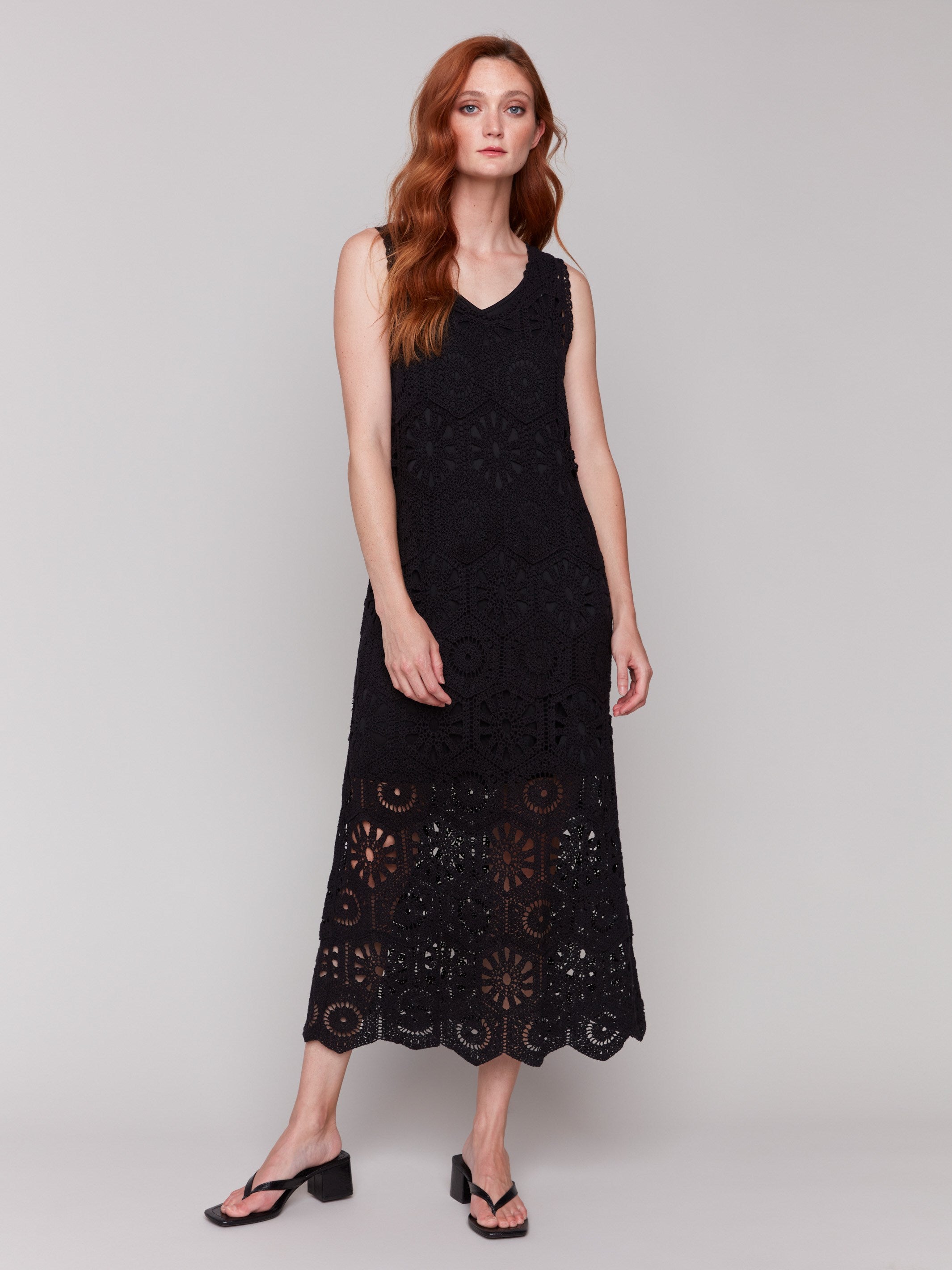 Elegant sleeveless black dress with cotton lining by Charlie B.