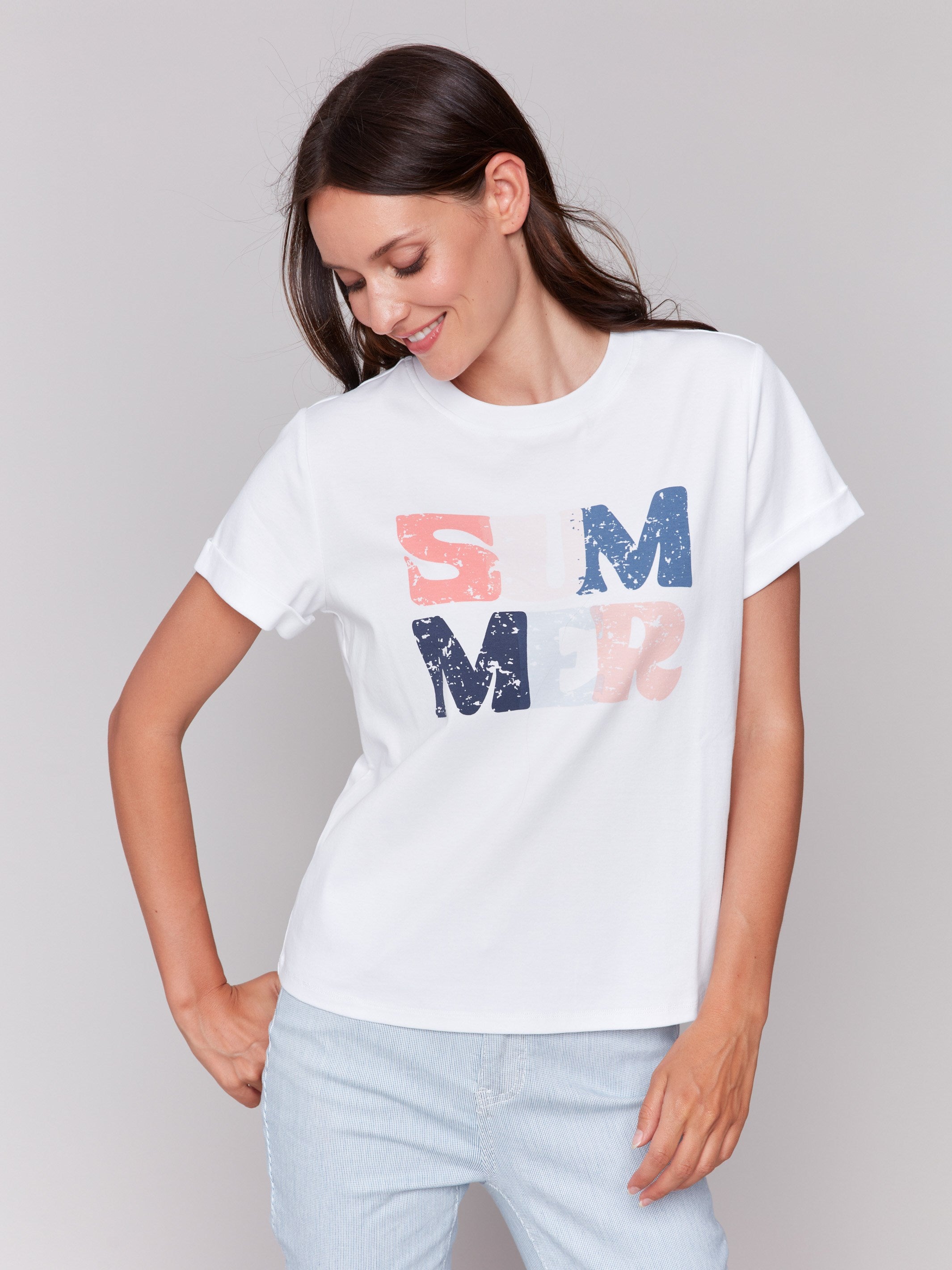 Graphic t-shirt in white showcasing comfortable short sleeves by Charlie B.