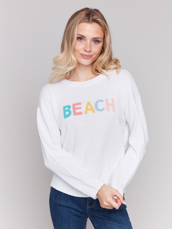 Elegant round neck sweater with bold graphics by Charlie B.