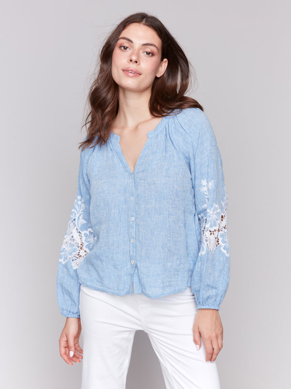Chambray blouse featuring a stylish V-neck design by Charlie B.