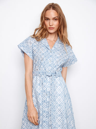 This dress is designed with a self-tie at the waist for a flattering fit. Its adjustable feature adds versatility and charm by Charlie B.