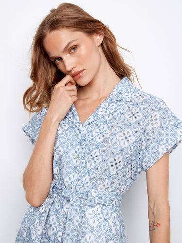 A button-front closure adds practicality and style to this dress. The buttons are seamlessly integrated into the design by Charlie B.