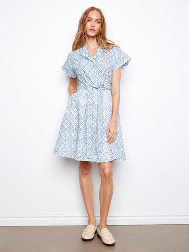 Hidden pockets provide convenience without compromising the sleek silhouette of this dress. A perfect blend of style and function by Charlie B.
