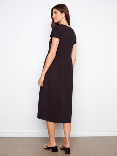 Stylish black dress with a comfortable fit and classic short sleeves by Charlie B.