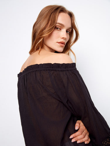 Stylish black blouse featuring an off-the-shoulder design and button-front details by Charlie B.