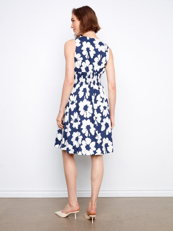 Fashionable front-zip closure on this floral print dress enhances its modern look. By Charlie B.