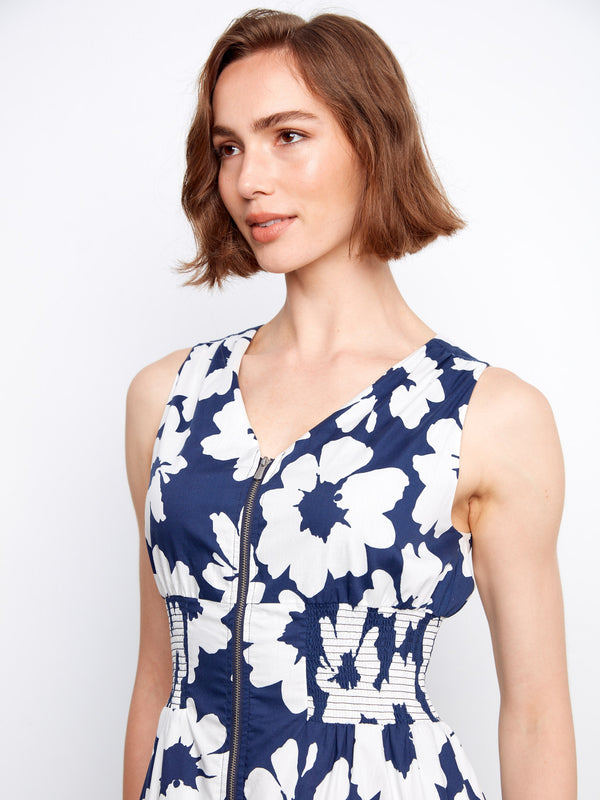 Charming V-neck floral dress offers both elegance and comfort in every wear. By Charlie B.