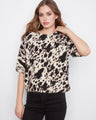Chic top in soft brushed knit with a relaxed fit, offering comfort and style for any occasion. By Charlie B.
