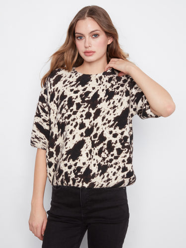 Chic top in soft brushed knit with a relaxed fit, offering comfort and style for any occasion. By Charlie B.