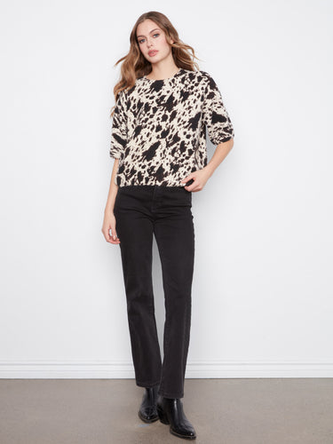 Elegant mock neck design adds sophistication to this comfortable and stylish top. By Charlie B.
