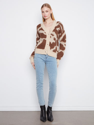 Effortless elegance in a button-front closure design, perfect for layering by Charlie B.