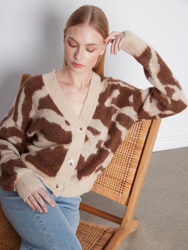 Button-front closure provides convenience and style for everyday wear by Charlie B.