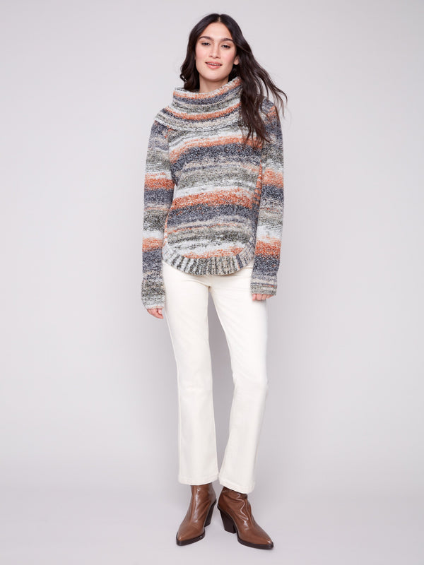 Chic striped sweater featuring a stylish round hem, blending comfort and elegance seamlessly by Charlie B.