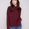 Cabernet sweater with cowl neck and drop shoulders, featuring a chevron pattern. Cozy and stylish by Charlie B.