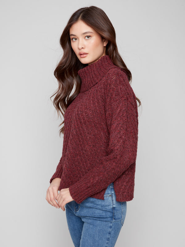 Elegant cabernet sweater featuring ribbed cuffs and a chic cowl neckline by Charlie B.