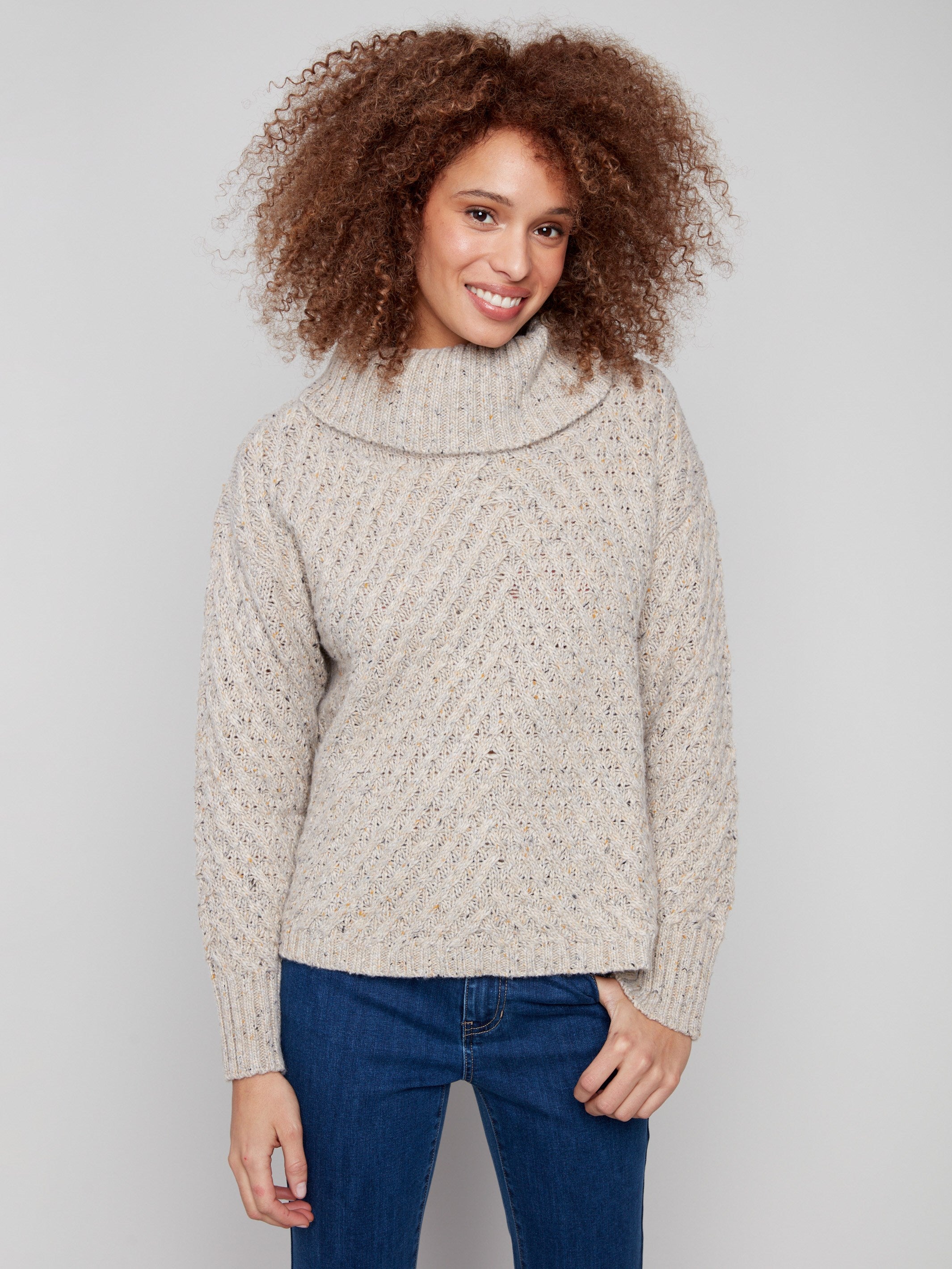 Stylish cowl neck sweater in Heather Oat, offering a relaxed silhouette and elegant cable knit texture by Charlie B.