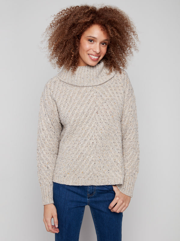 Stylish cowl neck sweater in Heather Oat, offering a relaxed silhouette and elegant cable knit texture by Charlie B.
