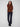 Chic sepia sweater with a stylish slit hem, adding a modern touch to the classic cable knit design by Charlie B.