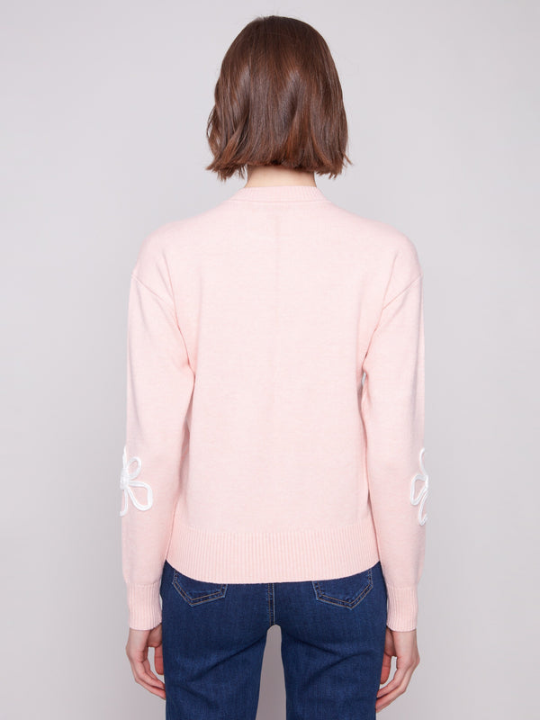 Soft sweater with ribbed hem offers a cozy yet fashionable look suitable for any occasion by Charlie B.