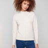 Heather Oat sweater featuring a classic crew neck design and intricate floral detail on the sleeves, offering timeless style by Charlie B.