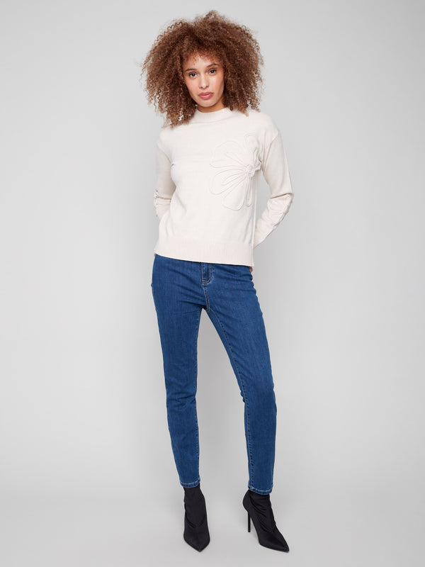 Elegant long-sleeve sweater in Heather Oat with ribbed cuffs and hem, adorned with delicate soutache flower patches by Charlie B.