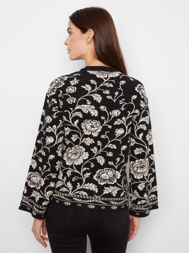 Enjoy the relaxed fit of this floral-patterned sweater for ultimate comfort and style. By Charlie B.