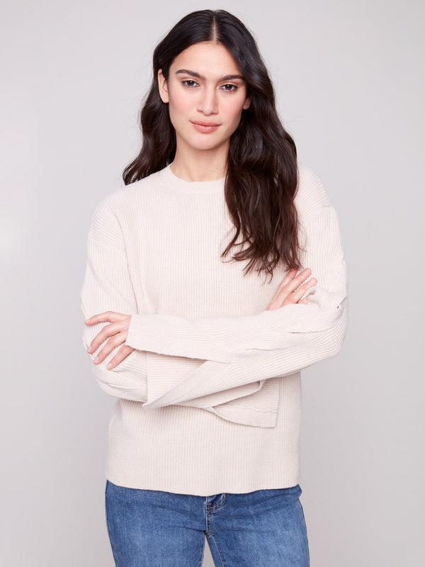Oat sweater featuring a crew neck and stylish drop shoulders, adding a relaxed touch to any outfit by Charlie B.