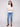 This heather oat sweater showcases elegant cable details on the sleeves, perfect for a chic look by Charlie B.