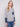 Heather grey sweater featuring a classic crew neck design and navy accents adds a stylish touch to any outfit by Charlie B.
