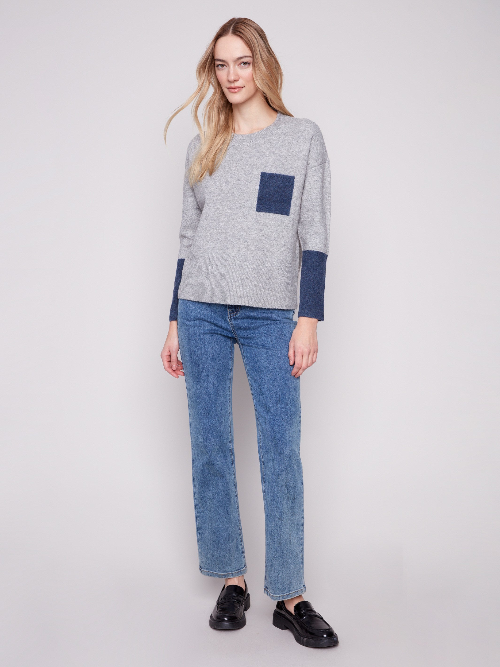 Long-sleeved heather grey sweater with navy contrast details, offering both comfort and style for casual wear by Charlie B.