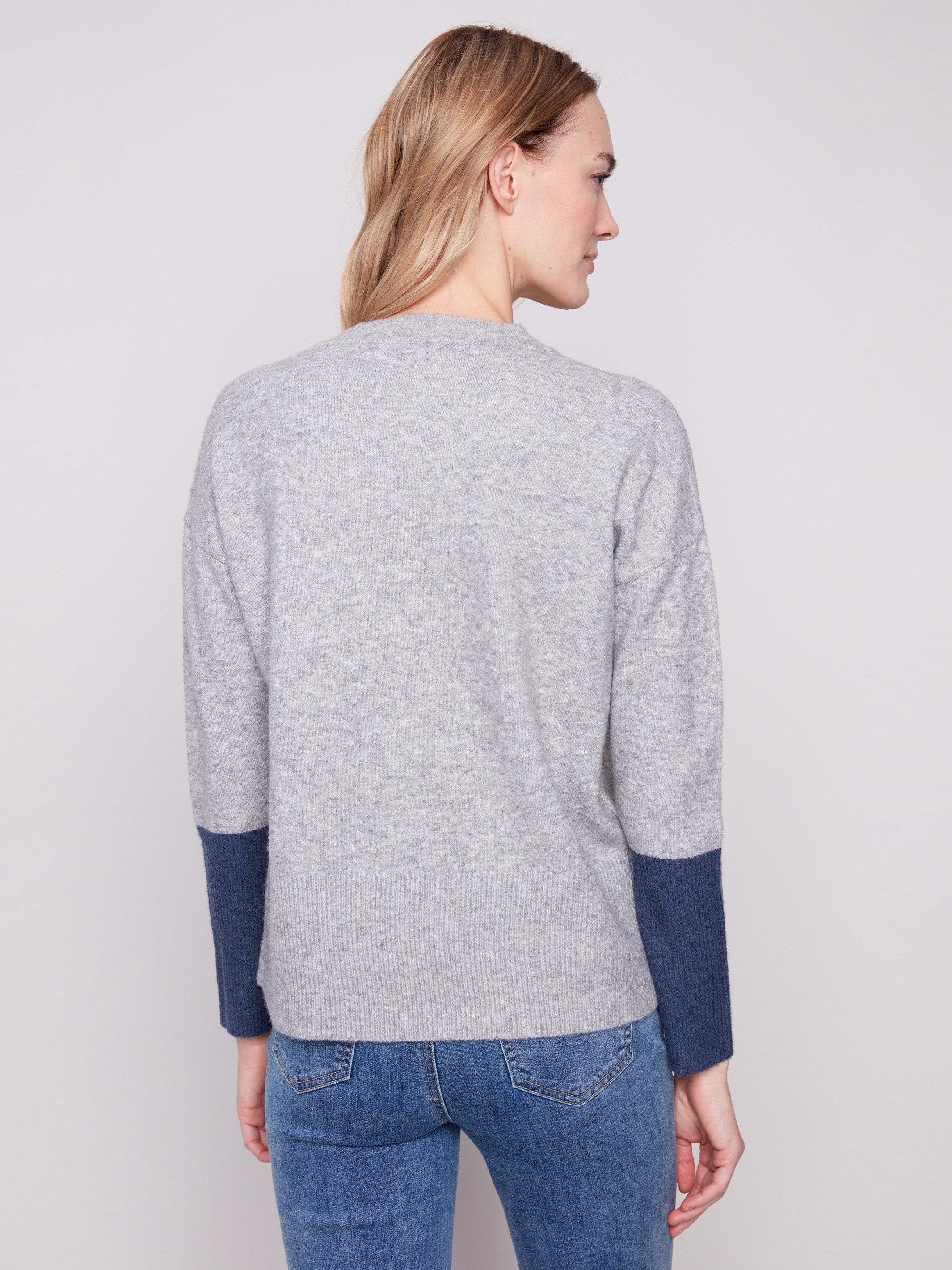 Soft heather grey sweater with ribbed cuffs in contrast navy, perfect for a chic yet relaxed look by Charlie B.