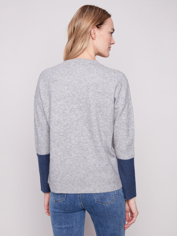 Soft heather grey sweater with ribbed cuffs in contrast navy, perfect for a chic yet relaxed look by Charlie B.