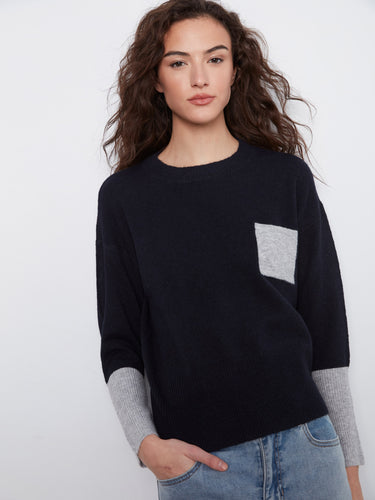 Crew neck navy sweater with contrast details and a spacious patch pocket, offering a stylish look by Charlie B.