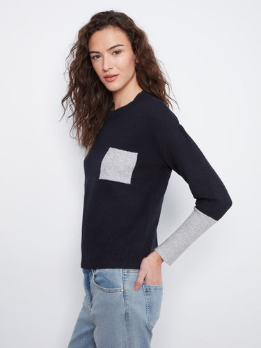 Relaxed fit navy sweater with grey accents on the sleeves and functional patch pocket by Charlie B.
