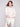 Elegant crew neck sweater adorned with intricate white floral details on the shoulders by Charlie B.