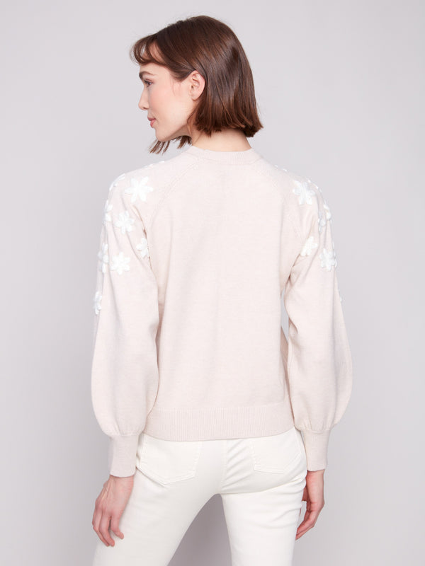 Heather oat sweater showcasing beautiful raglan puff sleeves and subtle floral accents by Charlie B.