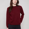 Cabernet sweater showcasing knit cuffs and a stylish design, perfect for any occasion by Charlie B.