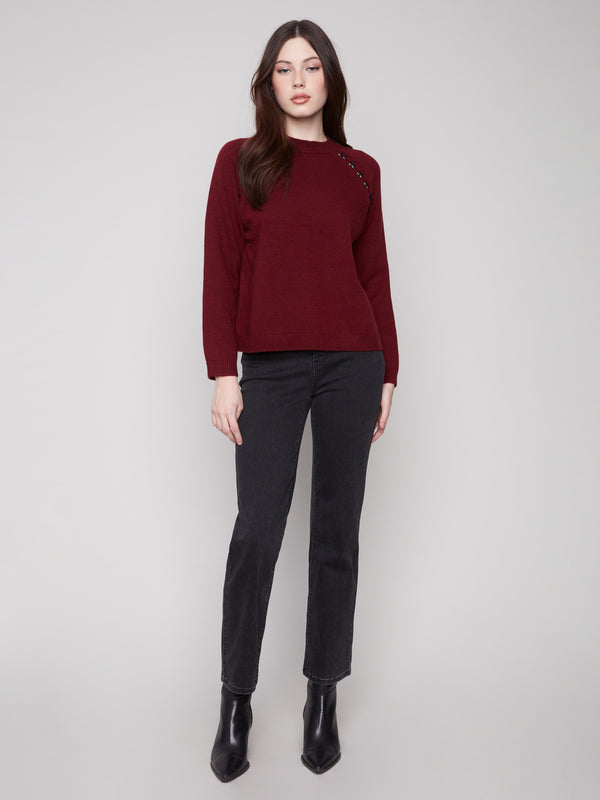 Elegant cabernet sweater with a classic crew neck, ideal for layering in cooler weather by Charlie B.