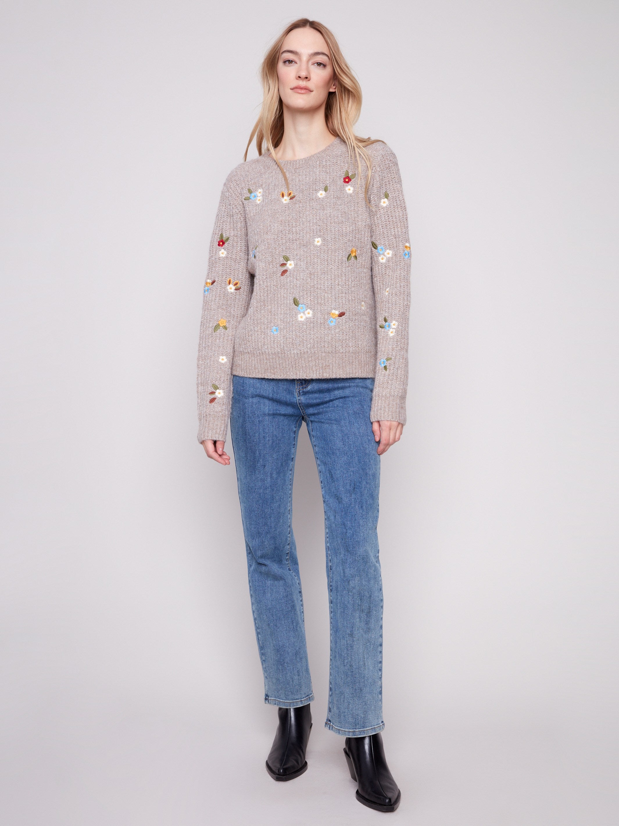 Heather sweater in light brown with vibrant floral details, featuring a classic crew neck design by Charlie B.
