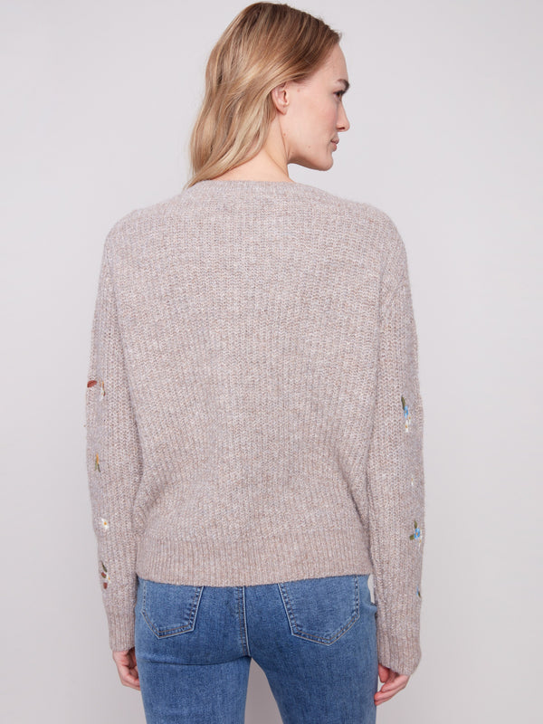 Heather light brown knit sweater, beautifully detailed with embroidered flowers and a comfortable fit by Charlie B.