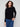 Black sweater with star stud details, showcasing its classic crew neck design. Perfect for casual outings. By Charlie B.