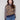 Sweater featuring a chic crew neck and bold leopard print design with striped sleeves, perfect for making a statement by Charlie B.