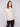 Heather oat sweater featuring a classic crew neckline and knit cuffs, offering timeless style by Charlie B.