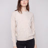 Heather oat sweater featuring a classic crew neckline and knit cuffs, offering timeless style by Charlie B.