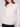 Beautiful tonal floral embroidery adds subtle detail to this heather oat sweater by Charlie B.