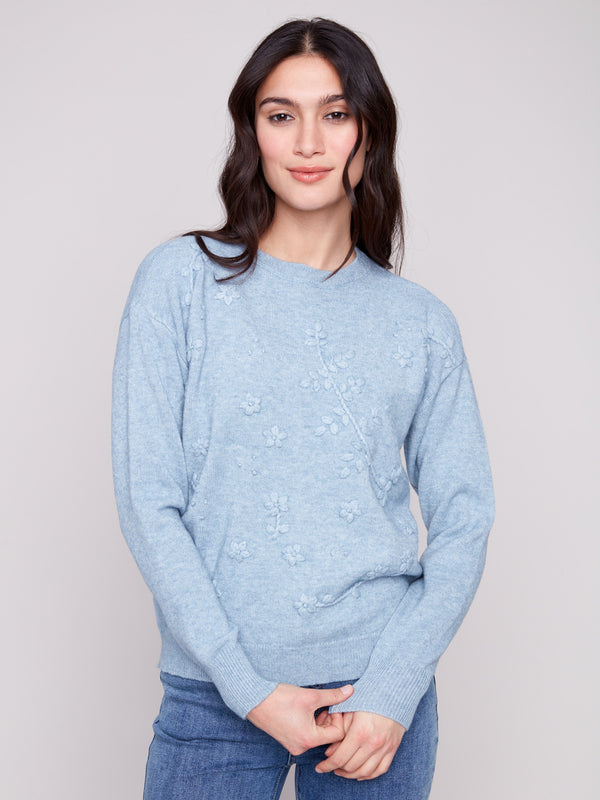 Oxford sweater with a classic crew neckline and knit cuffs, featuring elegant tonal embroidery by Charlie B.
